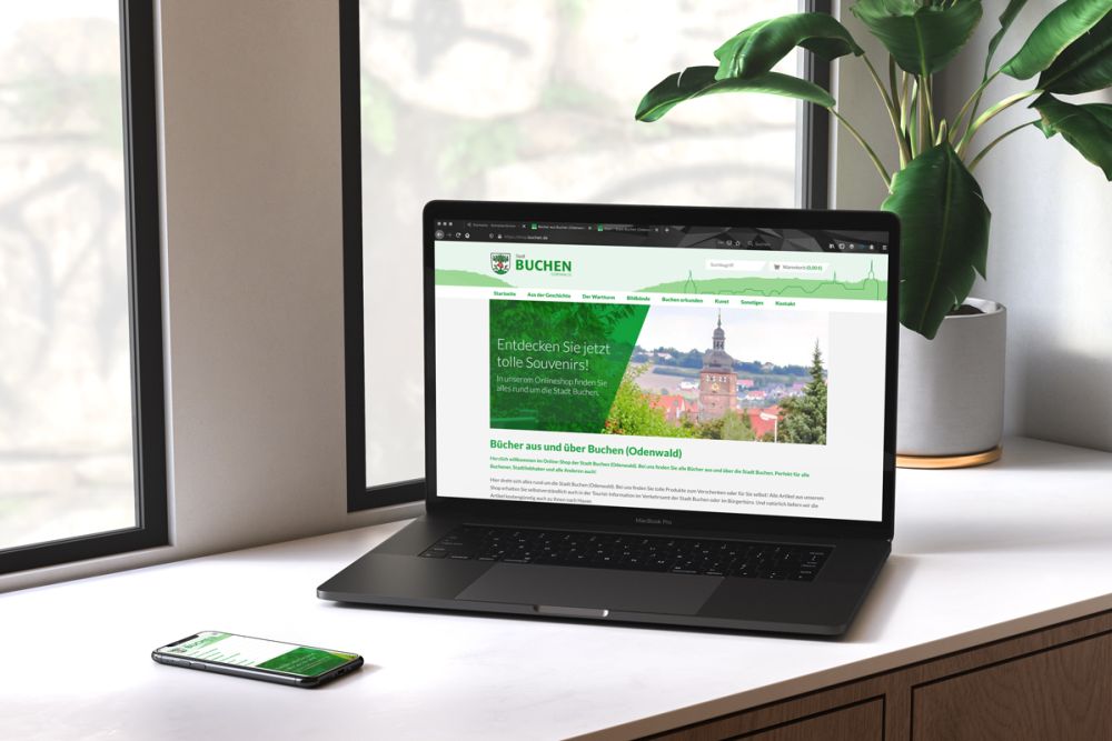 Onlineshop Stadt Buchen auf einem Laptop und Handy