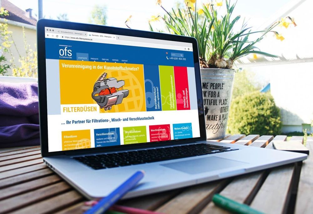 Webseite OFS auf einem Laptop
