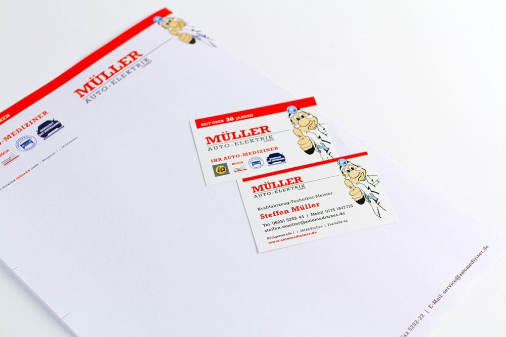 Visitenkarten und Schreibblock im Corporate Design von Auto Elektrik Müller