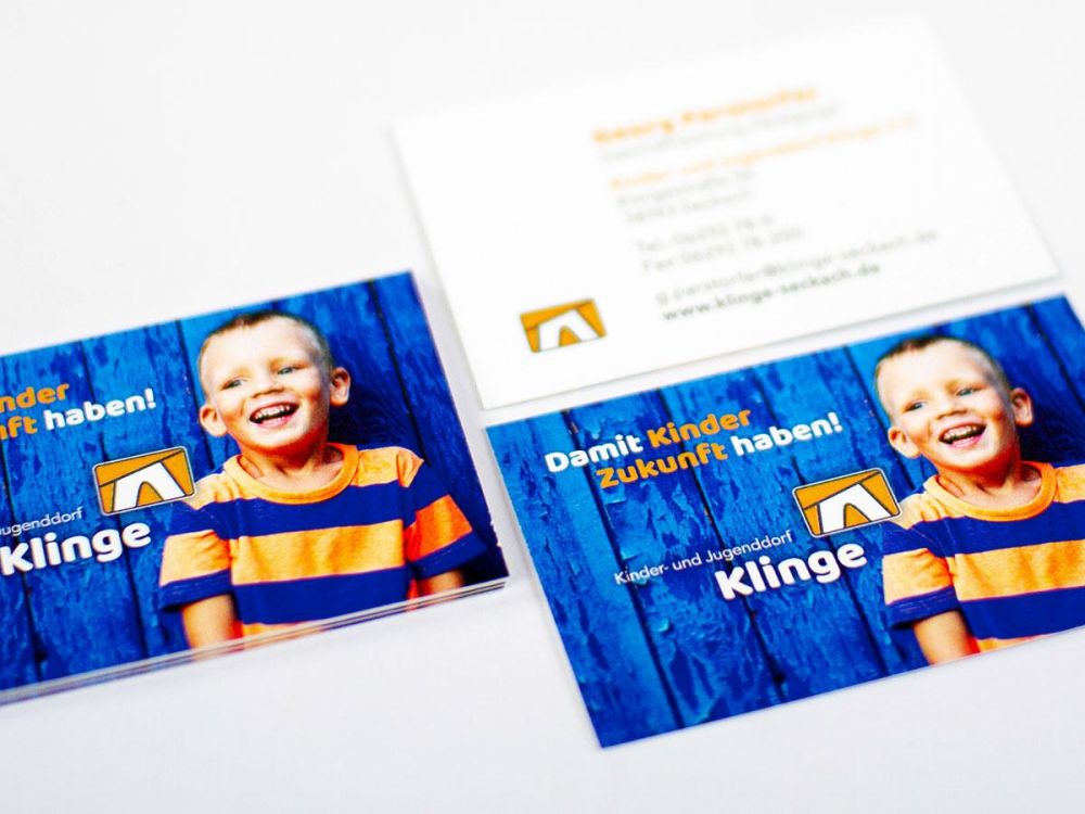 Visitenkarten für das Kinder- und Jugenddorf Klinge in blau/orange