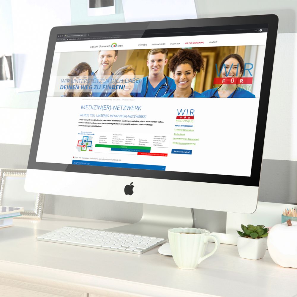 Wir für Mediziner Webseite auf einem iMac