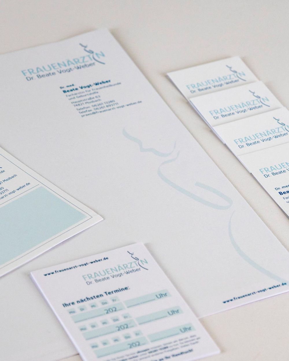 Terminkärtchen, Rezeptbogen und Briefpapier für Frauenarztpraxis Vogt-Weber