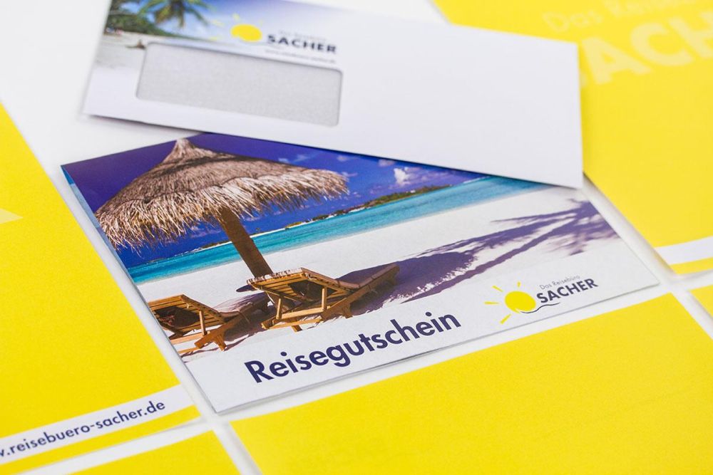 Reisebüro Sacher Reisegutschein und Briefumschläge 